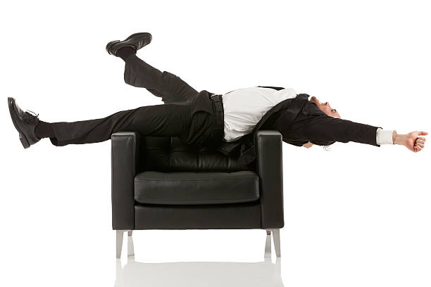 istock Businessman stretching on armchair 172467588