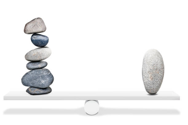 istock Balancing stones on seesaw 172467753