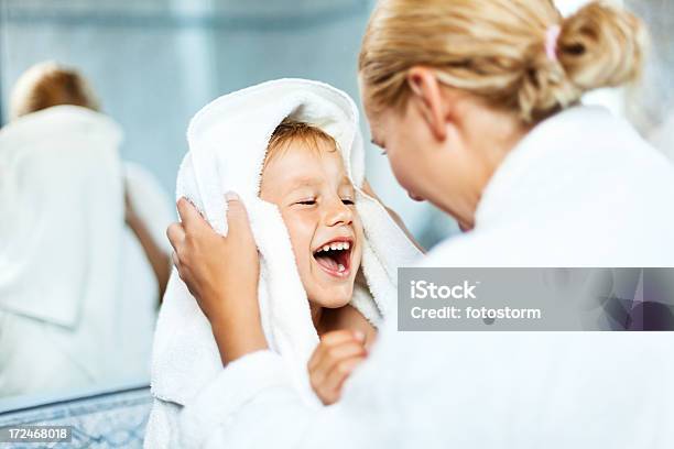 Mother Drying Up Son After Bath Stock Photo - Download Image Now - Child, Bathtub, Towel