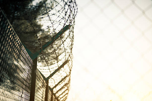 istock Barbed Wire Fence in Jail 172468097