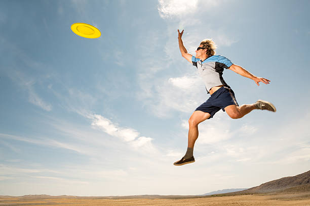 istock Jumping to Catch a Frisbee 172468515