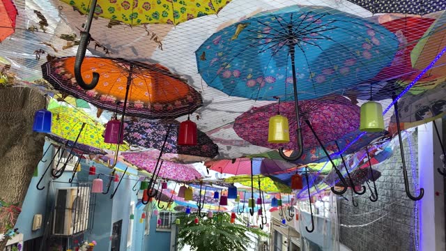Street with multicolored umbrellas