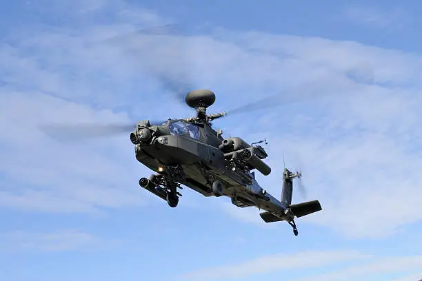 Apache helicopter on final approach for landing.Other Apache images