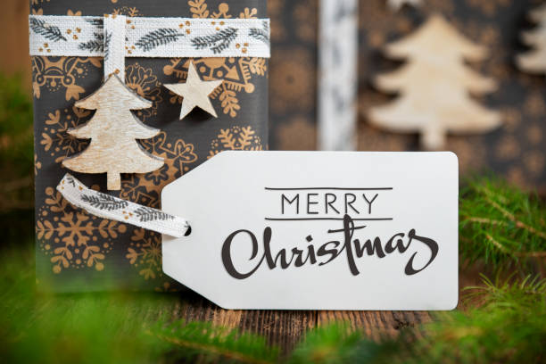 istock Text Merry Christmas, On Label, Christmas Gifts Background 1724693472