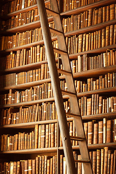 istock old library with books and ladder 172470104