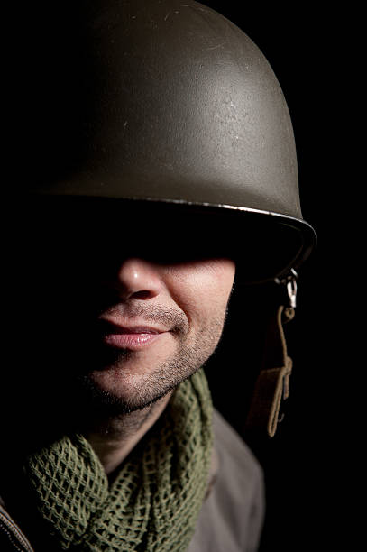 istock Smiling G.I. Soldier In Shadow 172470236