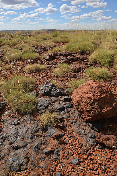 istock Unmined surface iron ore deposits surrounded by spinifex. 172470293
