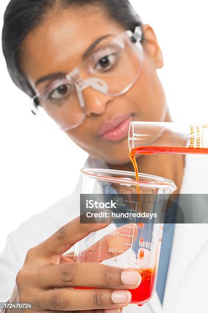 Female Scientist Doing Experiment Stock Photo - Download Image Now - 30-39 Years, Accuracy, Adult