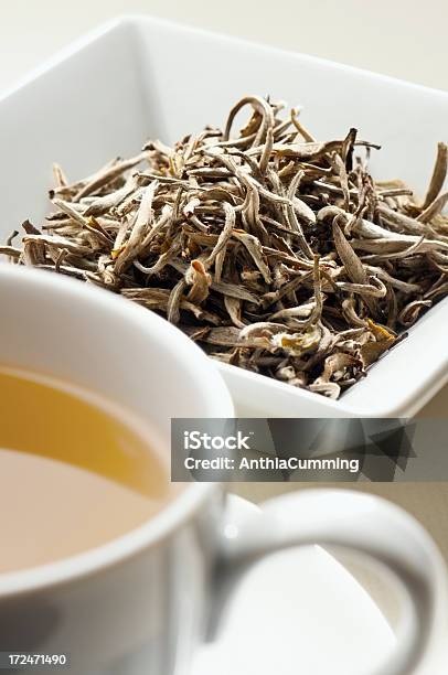 Foto de Folhas De Chá De Jasmim Atrás Xícara De Chá e mais fotos de stock de Antioxidante - Antioxidante, Bebida, Camellia sinensis