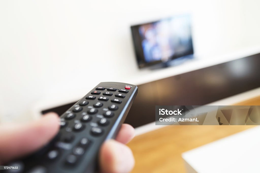 Con televisor de Control remoto - Foto de stock de Accesibilidad libre de derechos