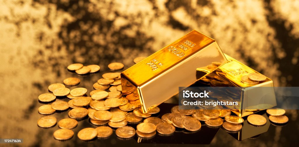 Gold ingots and coins  Gold - Metal Stock Photo