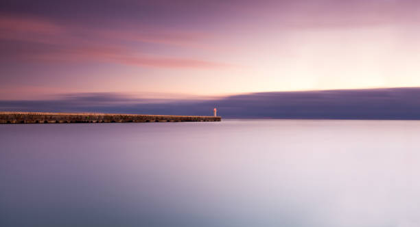 istock Lighthouse on the pier In sea 172471801