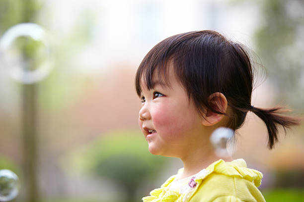 close up of lovely little asian girl smile