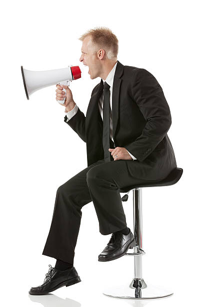 istock Businessman shouting into a megaphone 172472741