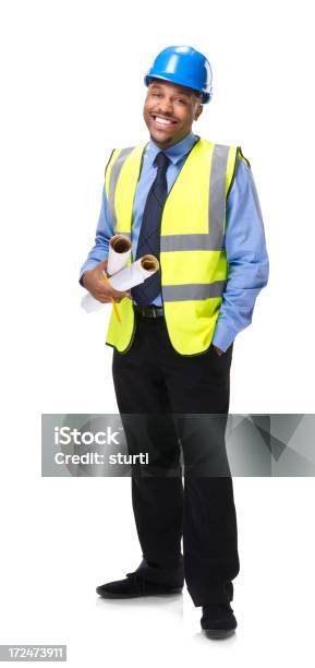 Feliz Contratista Planes De Retención Foto de stock y más banco de imágenes de Ingeniero - Ingeniero, Encuadre de cuerpo entero, Afrodescendiente