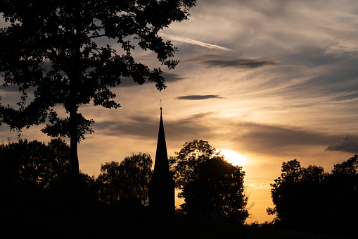 Old church steeple at sunset in East Texas next to the Shiloh road cemetery in Gregg county