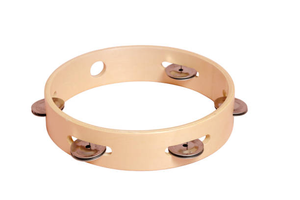 Musical instrument tambourine on a studio, isolated on white background. Llearning music with percussion instrument