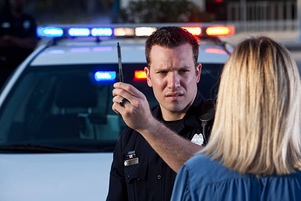 Police officer conducting sobriety test stock photo
