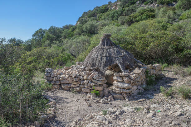 Mallorca, Spain - 8 Oct, 2023: Ancient charcoal huts at the Puig de sa Marisca archaeological site