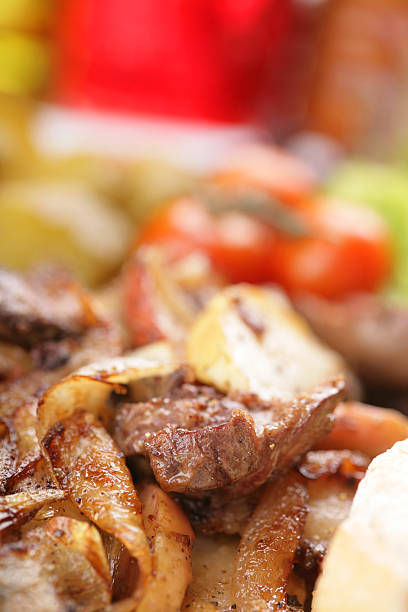 istock liver meat with onion and vegetables 172475524