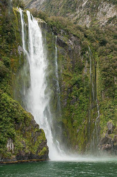 istock Heavy waterfall in Milford Sound 172476732