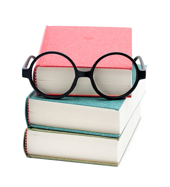 istock Books and glasses isolated on white background 172476763