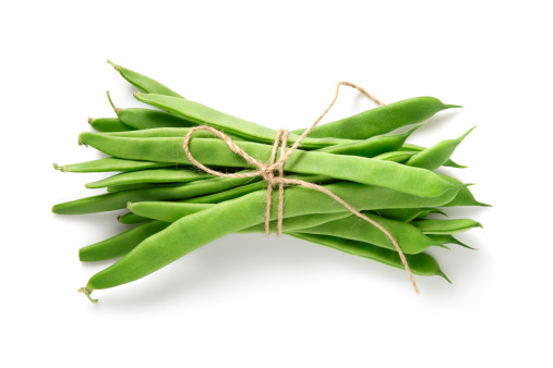 Bunch of fresh green beans on white background