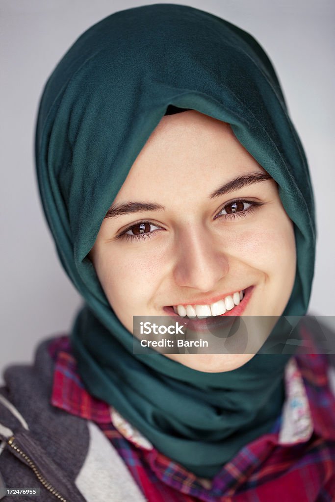 Pretty muslim girl Portrait of a smiling young muslim girl Headscarf Stock Photo
