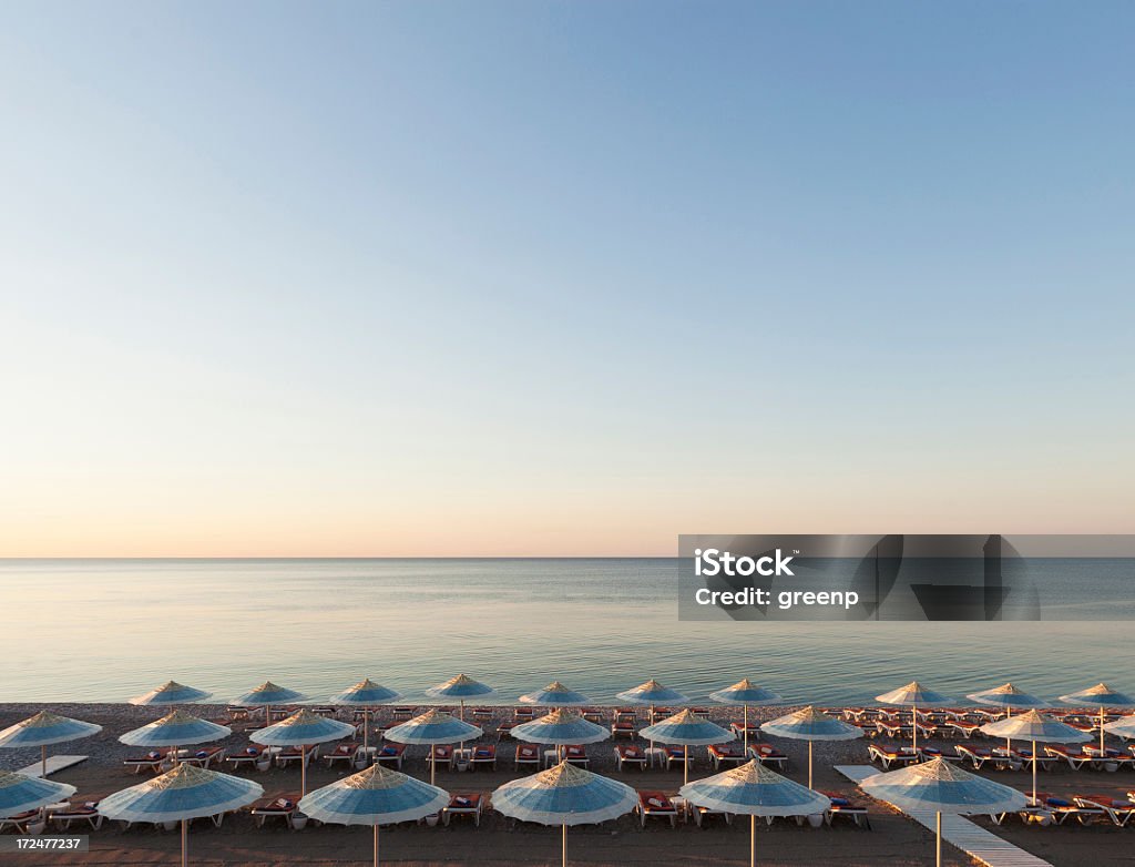 Praia e mar durante sunrising - Royalty-free Ao Ar Livre Foto de stock