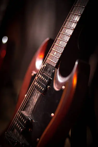 e-guitar on stage , shallow depth of field