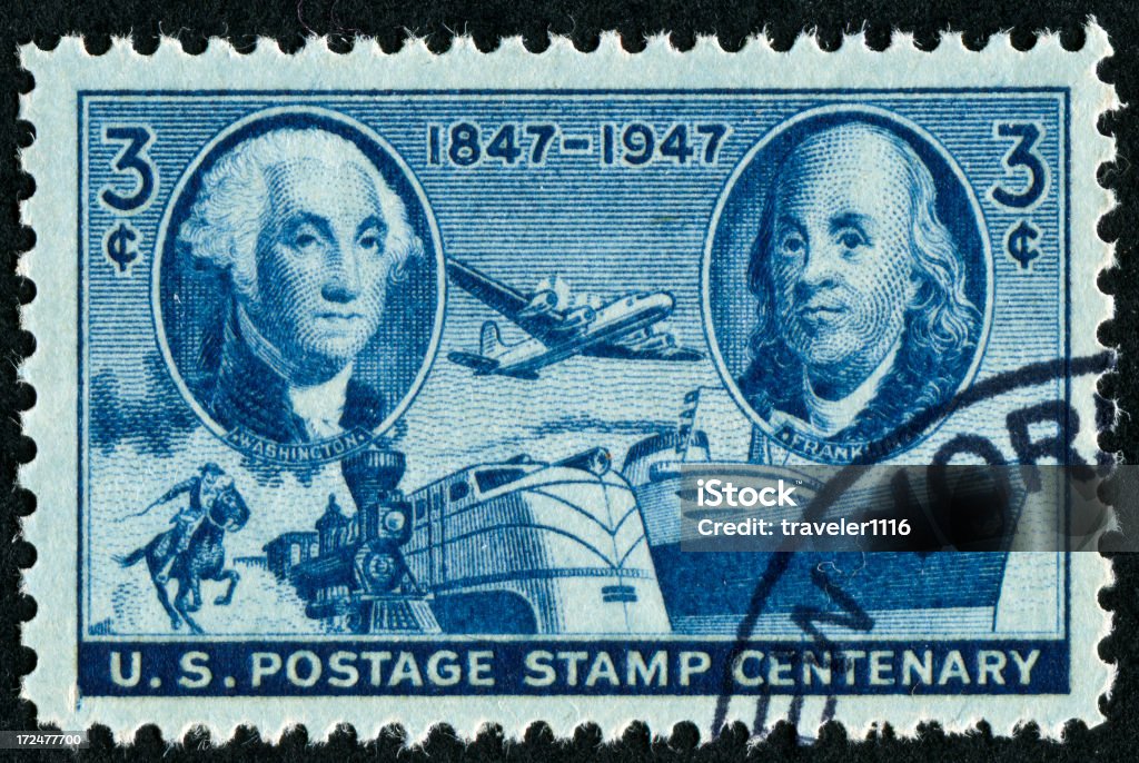 Washington And Franklin Stamp Cancelled Stamp From The United States Featuring George Washington And Ben Franklin.  Franklin Lived From 1706 Until 1790.  George Washington Lived From 1732 Until 1799.This Stamp Commemorates The 100th Anniversary Of The USPS. 100th Anniversary Stock Photo