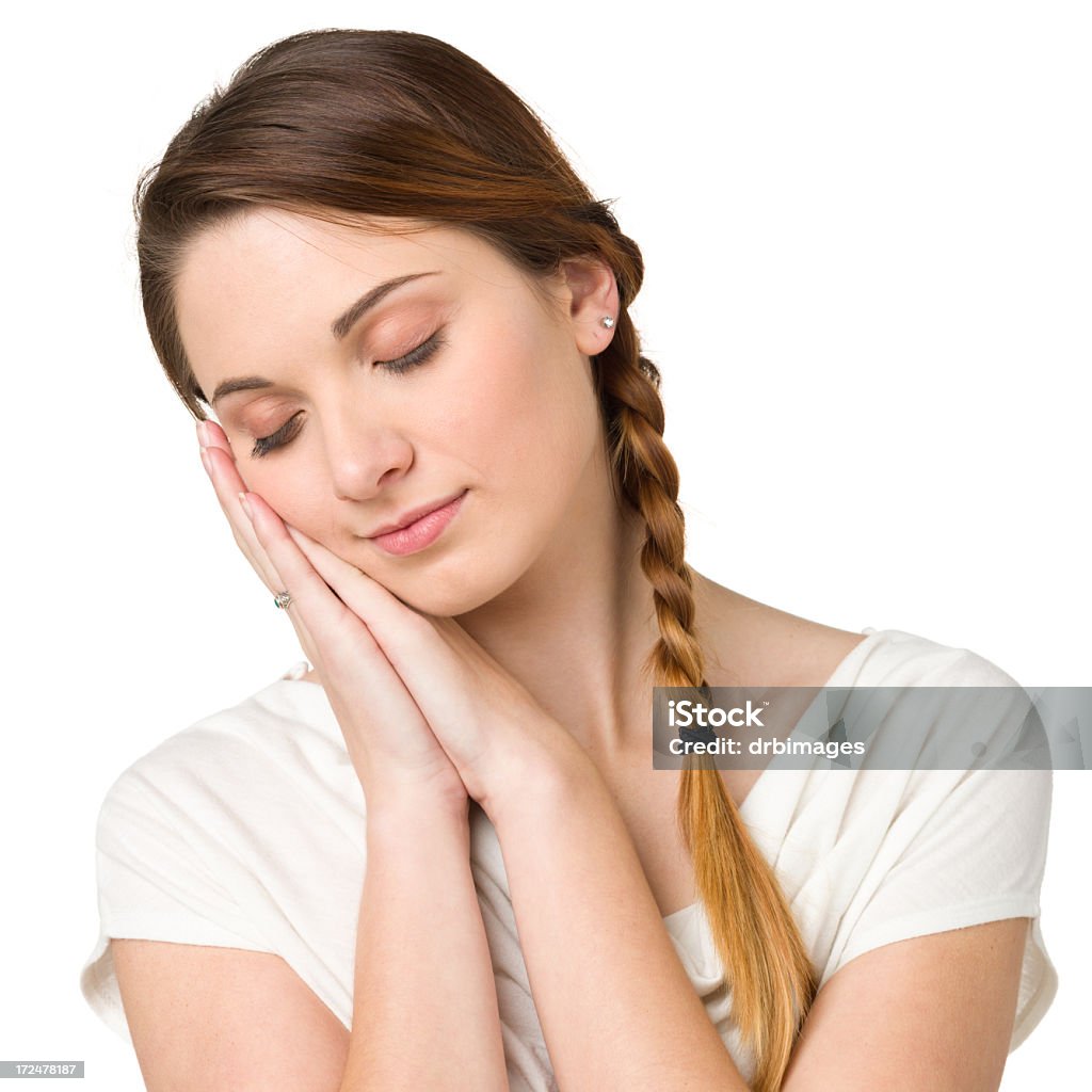 Sleeping Young Woman Portrait of a young woman on a white background. 20-24 Years Stock Photo