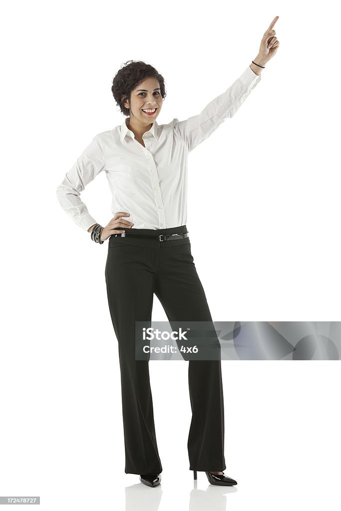 Heureuse Femme d'affaires soulevant doigt et souriant - Photo de Doigt levé libre de droits