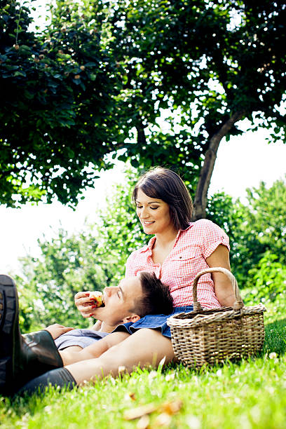 istock Young couple relaxing outdoors 172479187