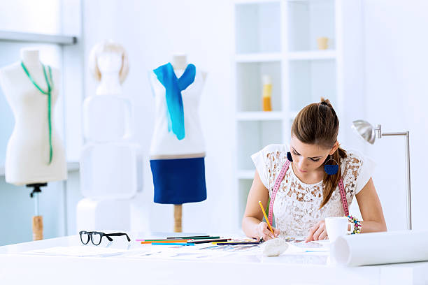istock Young female fashion designer sketching. 172479394