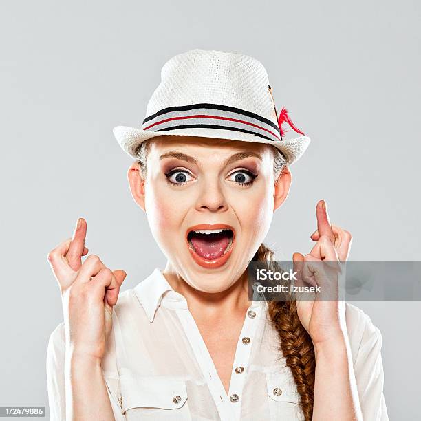 Young Woman Crossing Fingers Stock Photo - Download Image Now - 20-24 Years, Adult, Adults Only