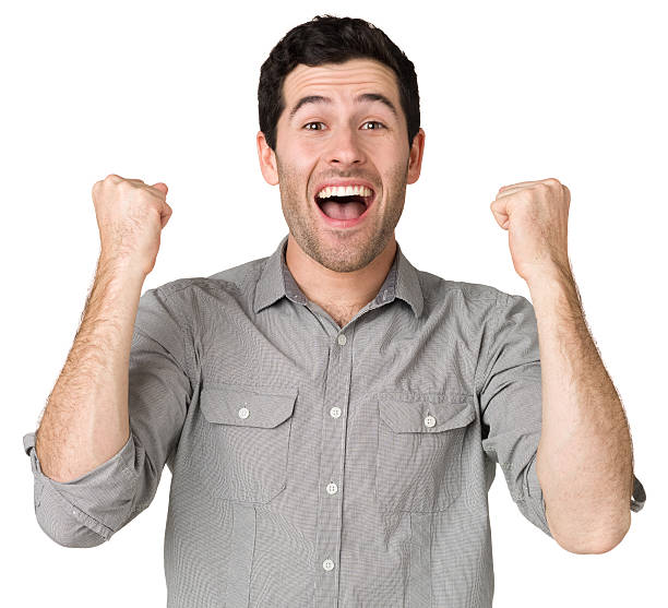 istock Excited Young Man Shaking Fists 172479917