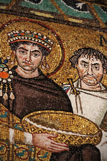 Detail of a mosaic depicting Justinian I and his court. It is in the Basilica of San Vitale, in Ravenna, and is from about the year 547 A.D.