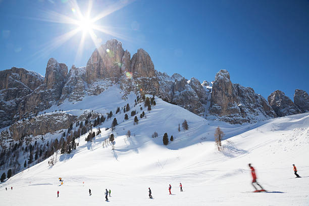 Skiers in The Dolomites stock photo