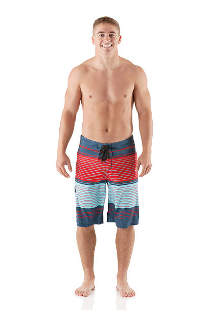 ポートレートの裸の男笑顔 chested - swimming shorts shorts swimming trunks clothing ストックフォトと画像