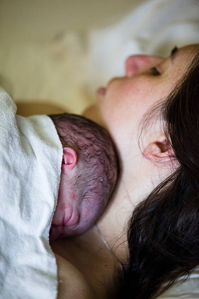 istock New born sleep on his mother 172481605