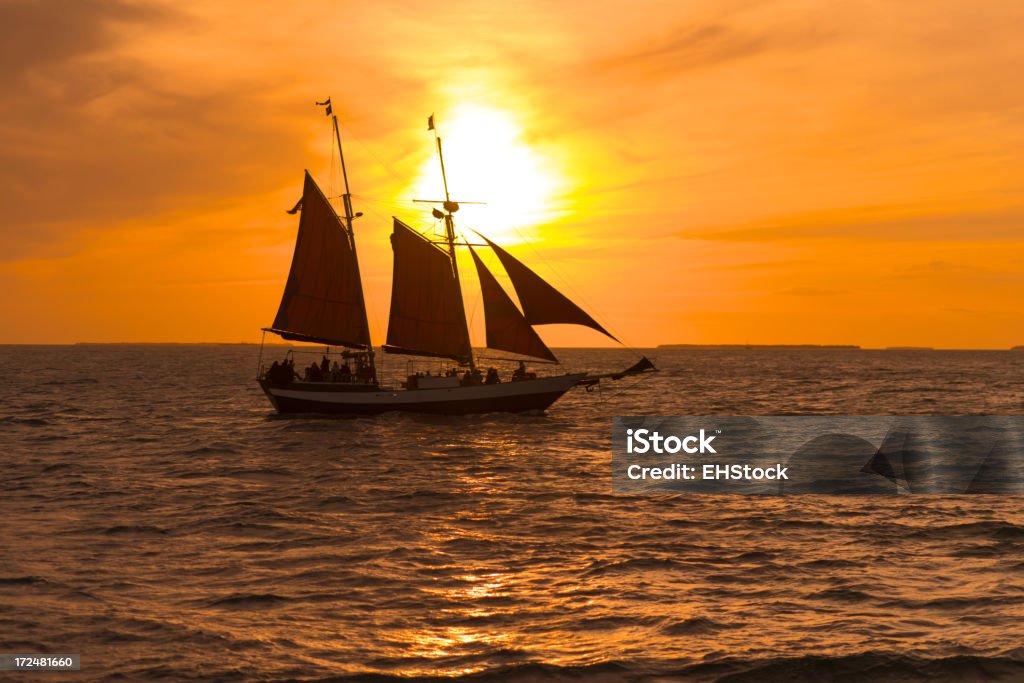 Touristen in eine Bootsfahrt bei Sonnenuntergang von Key West - Lizenzfrei Seeräuber Stock-Foto