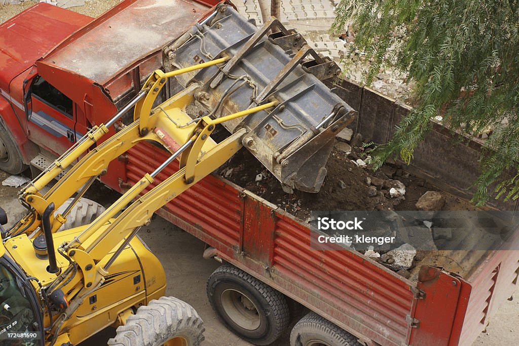 Niveleuse chargement camion dumper - Photo de Acier libre de droits