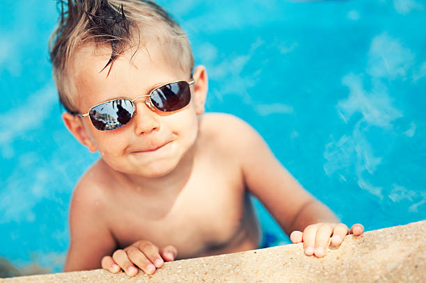 istock Cool boy in swimming pool 172481918