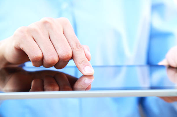 istock Business people hand holding digital tablet on light blue background 172482176