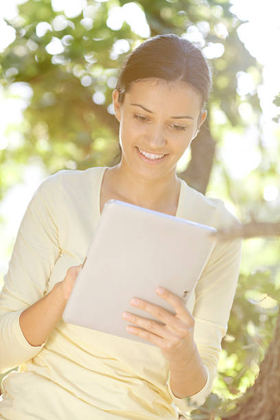 istock young woman working on tablet outdoor 172482396