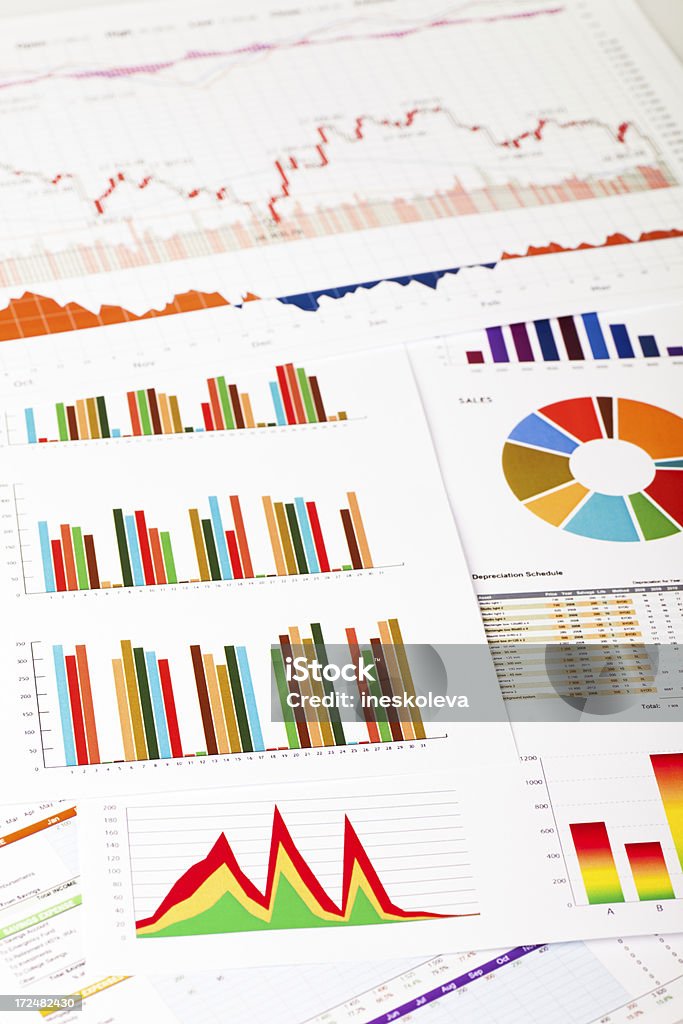 Graphs and Charts Finance documents with colorful graphs and chartsfor more similar files click here: Analyzing Stock Photo