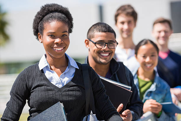 istock Female Student With Friends Standing In A Row 172482606