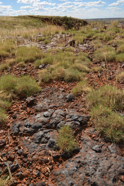 istock Unmined surface iron ore deposits surrounded by spinifex. 172483446
