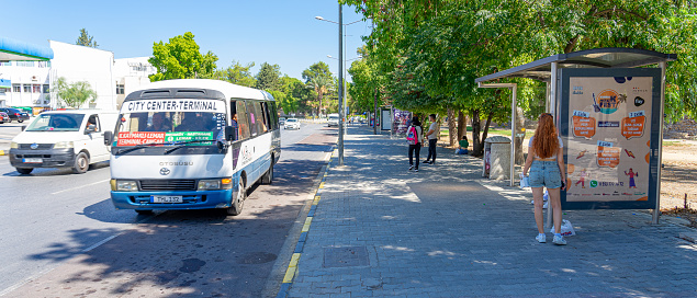 Archaic public transport buses along the border of the capital of Northern Cyprus, Lefkosa and Nicosia, capital of the Republic of Cyprus. Summer September 2023.